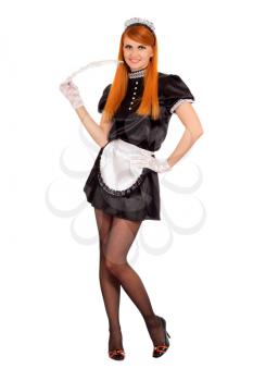 Young cheerful redhead maid. Isolated on white