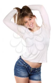 Young smiling woman demonstrating her long healthy hair. Isolated on white