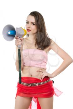 Sexy young brunette in red skirt and pink top posing with megaphone. Isolated on white