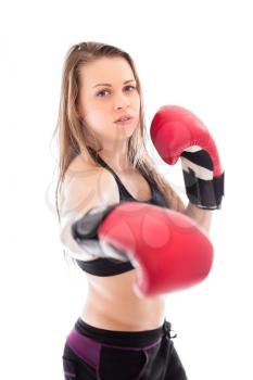 Portrait of young blond woman in red boxing gloves. Isolated on white