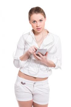 Portrait of lovely young woman posing with smartphone. Isolated on white