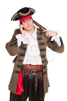 Portrait of young man with pistol talking on the phone. Isolated