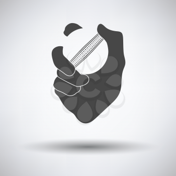 Hand holding cricket ball icon on gray background, round shadow. Vector illustration.