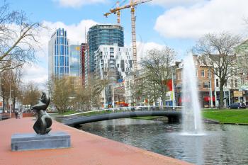 Bridge and  fountain on the canal in Rotterdam. Netherlands