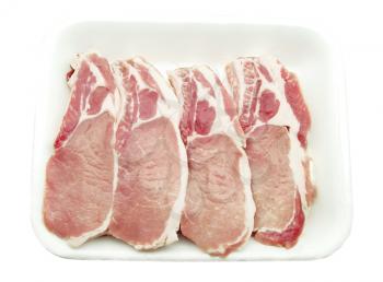 Pork chops packed in a container