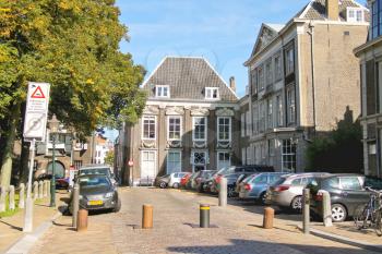 DORDRECHT, THE NETHERLANDS - SEPTEMBER 28: Cars on the street on September 28, 2013 in Dordrecht, Netherlands. Dordrecht city was founded in 11th century, the population of about 120,000 people