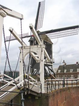 Bascule bridge and windmill in Heusden. Netherlands