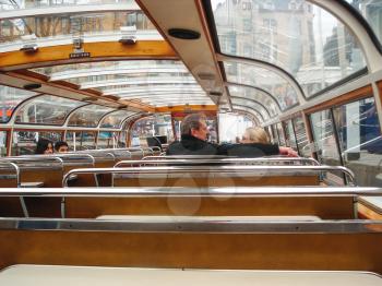 AMSTERDAM,THE NETHERLANDS - FEBRUARY 18, 2012 : Tourists inside the pleasure boat in  Amsterdam . Netherlands