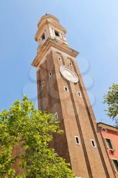 The clock on the Church Saint Apostoli bell tower of  in Venice, Italy 