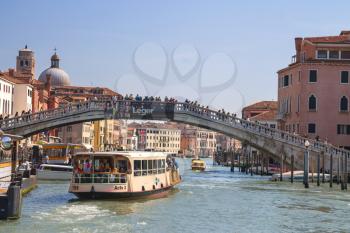 VENICE, ITALY - MAY 06, 2014: Active movement on a canal in sunny spring day,Venice, Italy