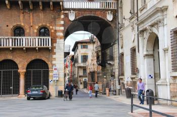 VERONA, ITALY - MAY 7, 2014: People on Piazza della Signoria in Verona, Italy