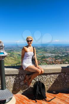 Attractive girl on the observation deck fortresses of San Marino