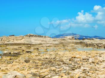 A view of a rocky shore of a Sicily island