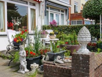 Street view of traditional house decorated with plants and flowers in Zandvoort, the Netherlands
