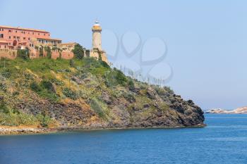 The lighthouse on the hill in Portoferraio, the main port of Elba island, Tuscany, Italy