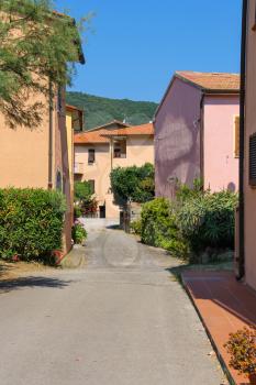 Narrow street of small picturesque town Marciana Marina on Elba Island, Italy