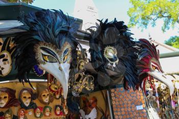 Venice, Italy - August 13, 2016: Traditional Venetian masks in street souvenir store