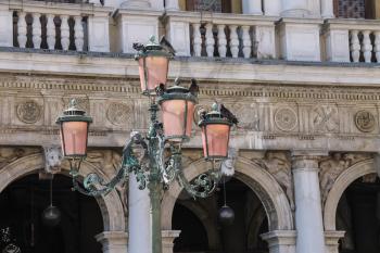 Old lantern on famous St. Mark's Square in Venice, Italy
