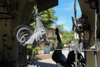 Grazzano Visconti, Italy - August 07, 2016: Metal weathervanes in vintage style