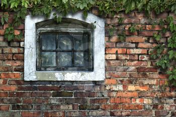 Old brick wall with wooden window in the background in grunge style