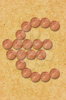 Euro currency sign shaped with cent coins