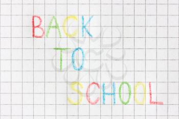 White squared paper sheet  with text	 Back to school