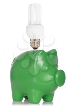 Smart energy concept. Green piggy bank with energy-efficient light bulb above