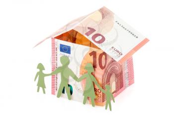 Family and their Euro house made from banknotes 
