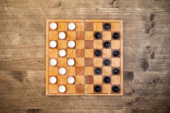 Top view of draughts checkers board game