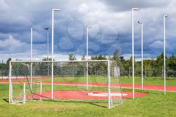 Stadium field with soccer gate,discus throwing sector and running track