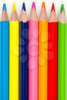 Close-up of a line of colored pencils