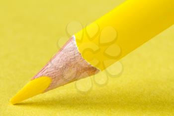 Yellow pencil on paper close-up. Business or education concept.