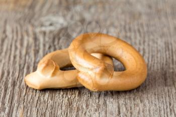 Close-up of small pretzels over wooden background