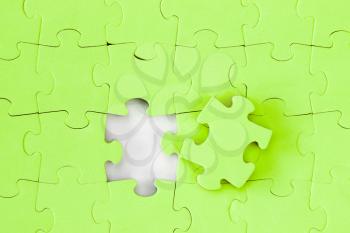 Jigsaw puzzle with the missing piece, solution concept