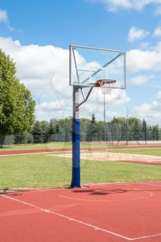 Public outdoor basketball court in a park