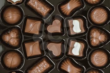 Box of delicious chocolate candies, close-up view