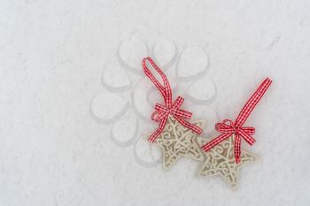 Christmas decorations stars with a red bows. Top view, copy-space.