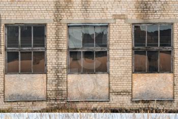 Windows in an old abandoned industrial building