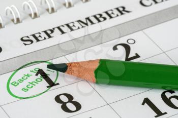 Circled in the calendar on September 1. Back to school concept.