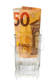 Fifty Euro placed in the alcohol glass. Money lost through alcohol addiction.