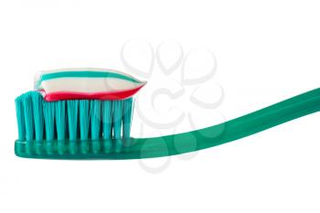 Toothbrush and toothpaste isolated on white background