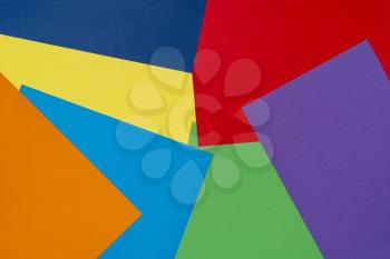 Multi-colored sheets of paper. Geometric background image. Creative template for your text.