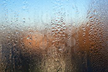 Rainy window with water drops