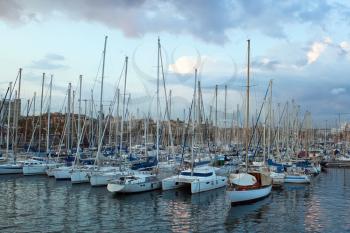 Barcelona yacht port in stormy evening