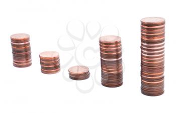 Five columns of coins isolated on white background