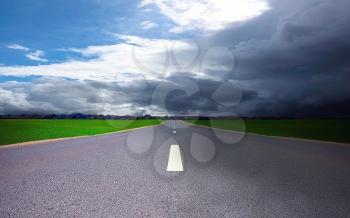 Road in field in storm time