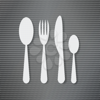 Silverware on the metal surface background