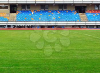 Football stadium with empty chairs