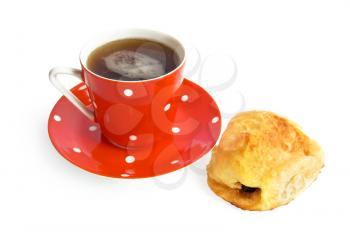 Coffee in the red with a white demitasse, golden homemade pie is isolated on a white background