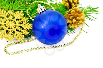 Christmas tree blue ball, golden cones, snowflakes and beads, green fir branches isolated on white background